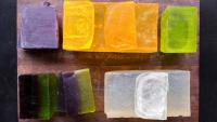 Assortment pack of grey, blue, green and white soaps.